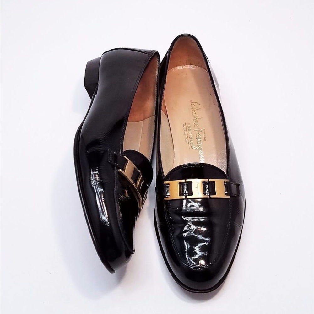 Salvatore Ferragamo Black and Gold Loafers